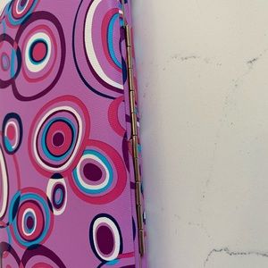Purple with designs on it wallet